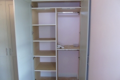 Short hang rail with shelving, bespoke wardrobes